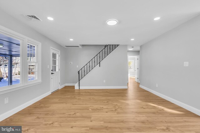 entrance foyer featuring light hardwood / wood-style floors