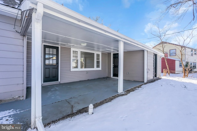 exterior space featuring a carport