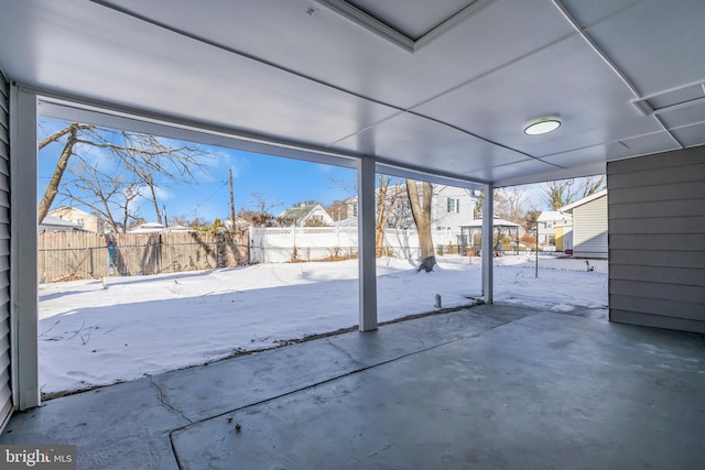 view of snow covered patio