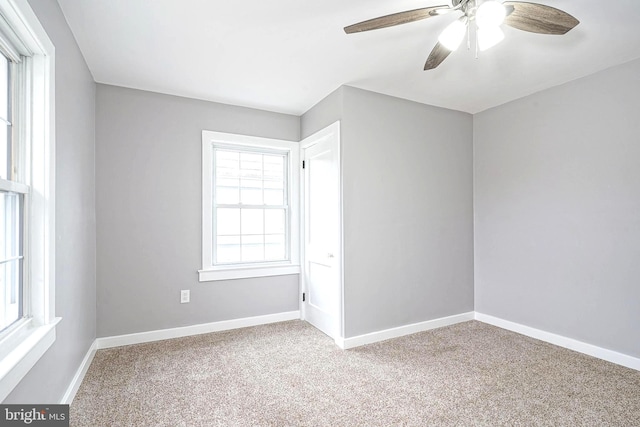 unfurnished bedroom with carpet flooring and ceiling fan