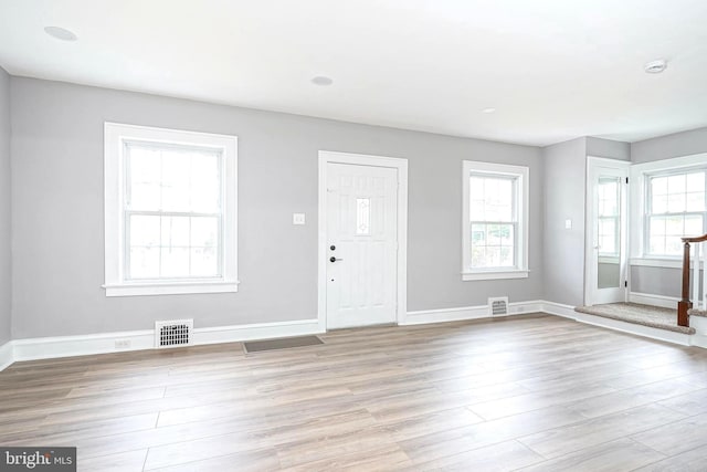 foyer entrance featuring light hardwood / wood-style floors