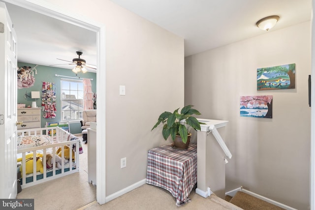 hallway with carpet flooring