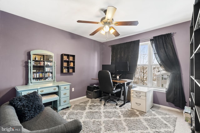 office area with light carpet and ceiling fan