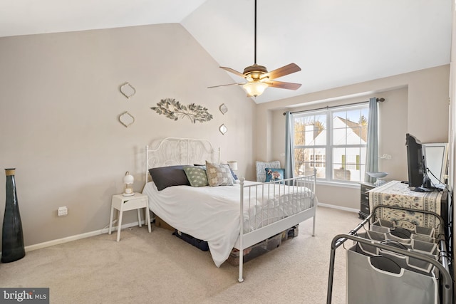 carpeted bedroom featuring ceiling fan and lofted ceiling