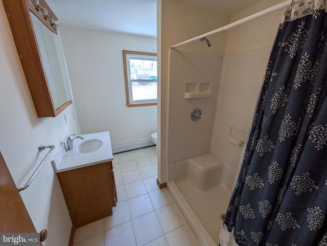 bathroom with vanity, a baseboard heating unit, tile patterned floors, a shower with curtain, and toilet