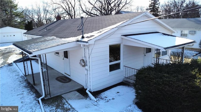 view of snow covered property