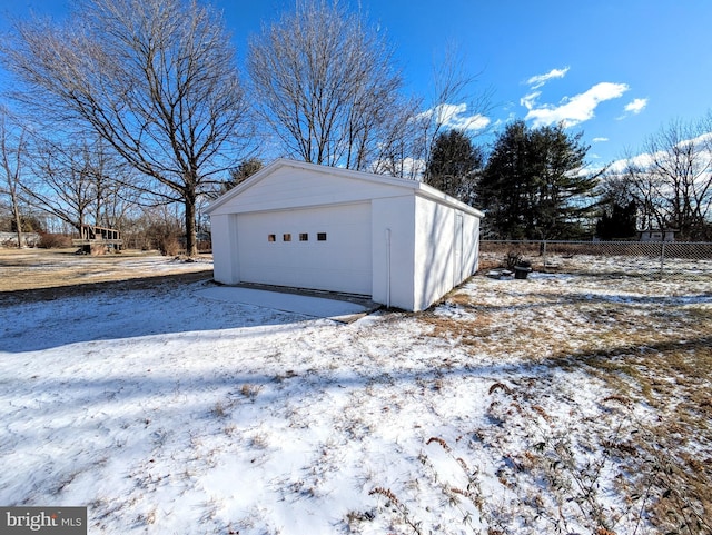 view of snow covered garage