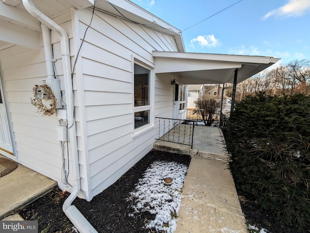 doorway to property featuring a porch