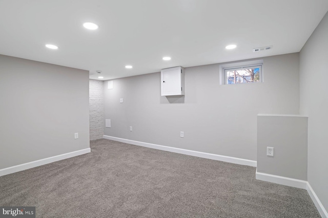 basement featuring carpet floors