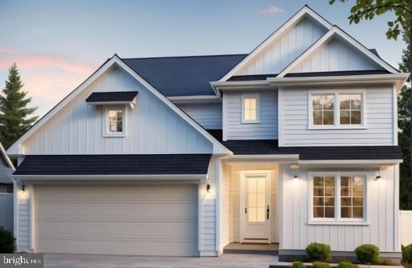 view of front of property with a garage