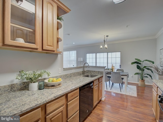 kitchen with light stone counters, ornamental molding, sink, dishwasher, and hanging light fixtures