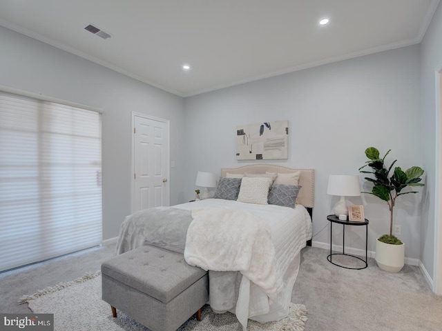 carpeted bedroom featuring ornamental molding