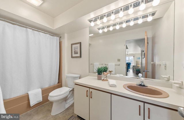 full bathroom with toilet, shower / tub combo with curtain, tile patterned flooring, and vanity