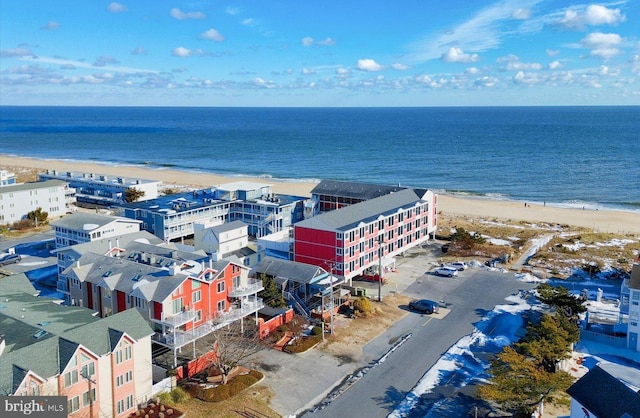 aerial view featuring a water view and a view of the beach