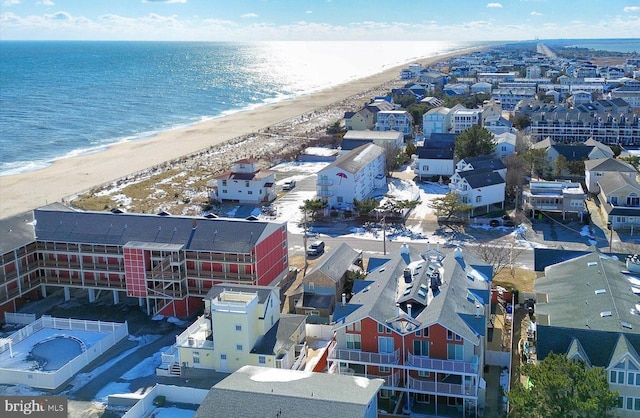 aerial view featuring a water view and a beach view