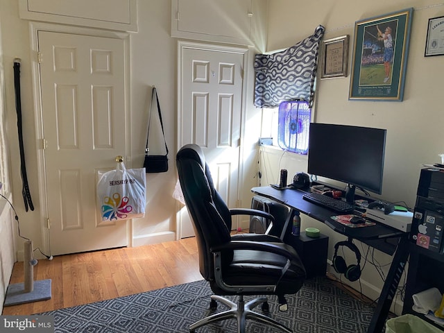 office area with wood-type flooring