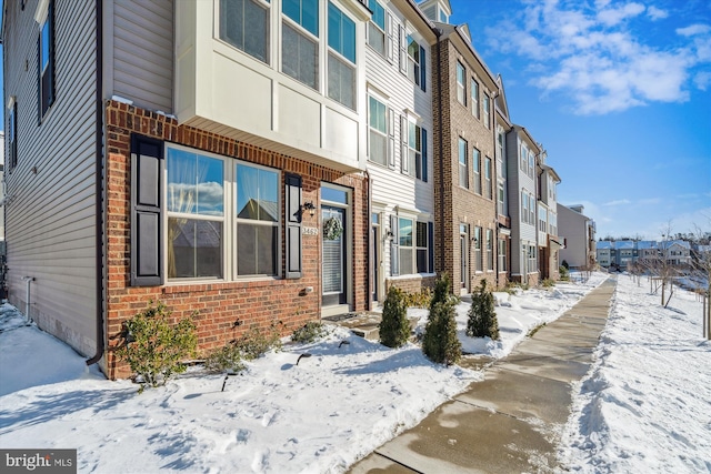 view of snow covered building