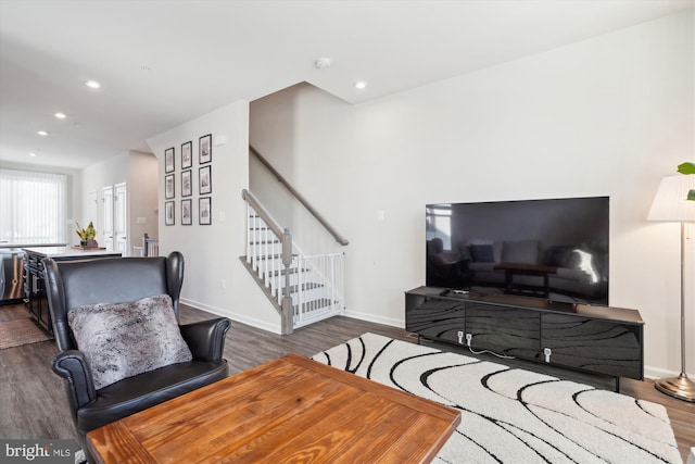 living room featuring dark hardwood / wood-style floors