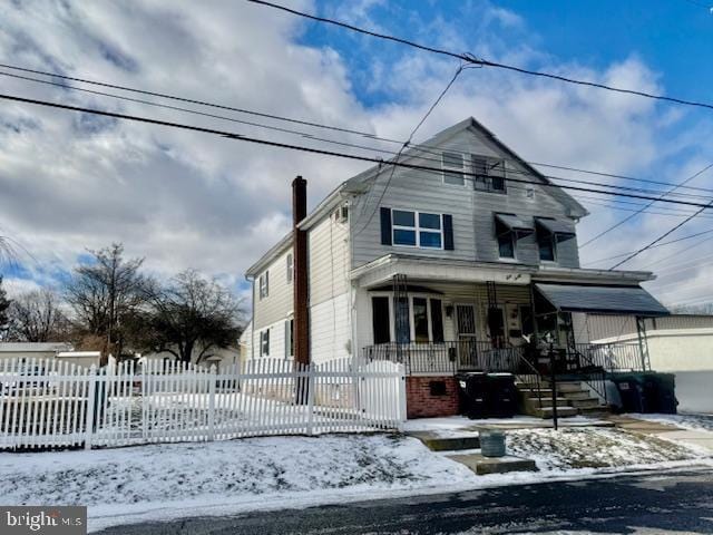 front of property with a porch