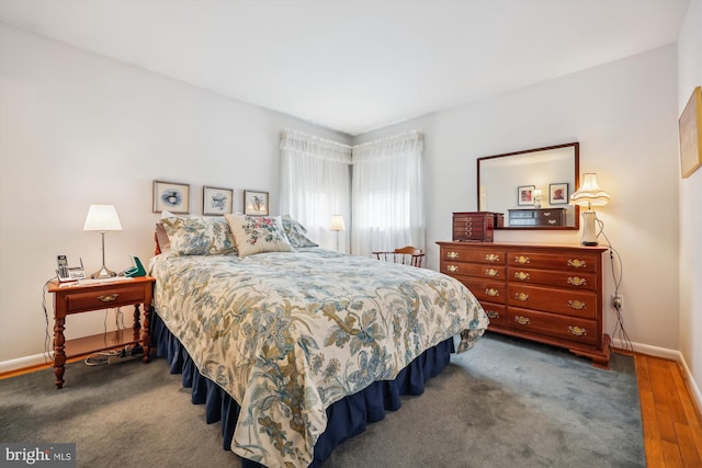 bedroom featuring hardwood / wood-style floors