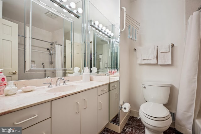 bathroom featuring a shower with curtain, toilet, and vanity