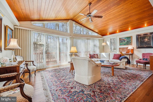 living room with ceiling fan, wood-type flooring, wood ceiling, and vaulted ceiling