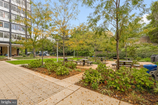 view of home's community featuring a playground