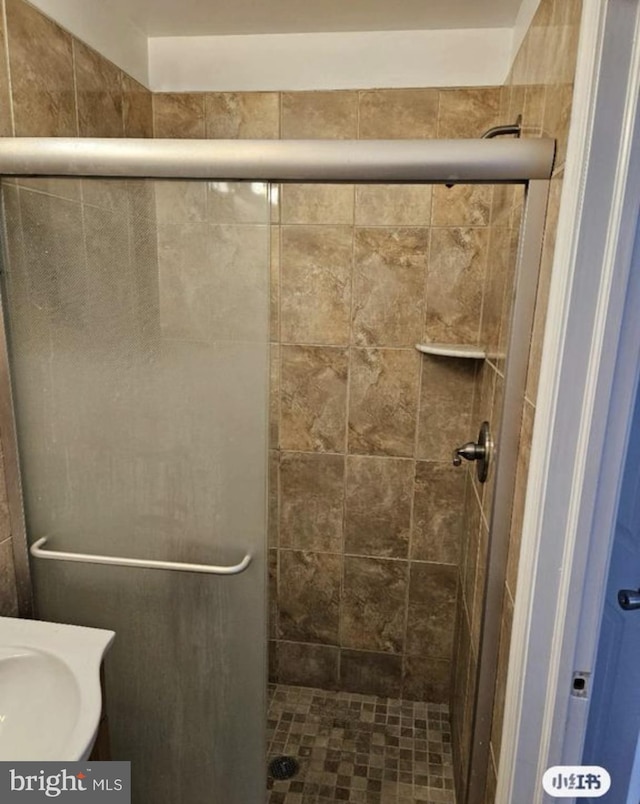 bathroom featuring a stall shower