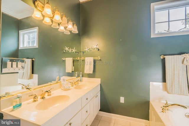 bathroom featuring a bathing tub, tile patterned floors, and vanity