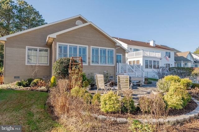 back of house featuring a patio