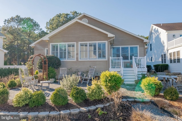 back of property featuring a patio area