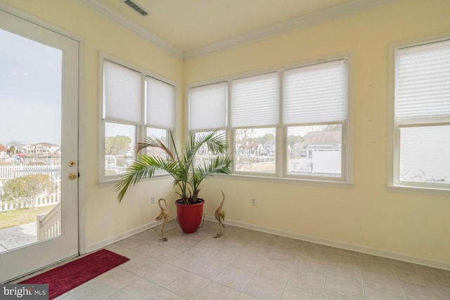 unfurnished sunroom with a wealth of natural light