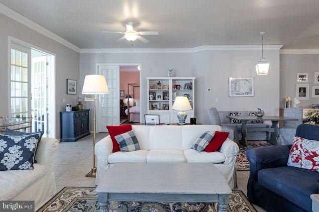 living room with ceiling fan, light tile patterned floors, and crown molding