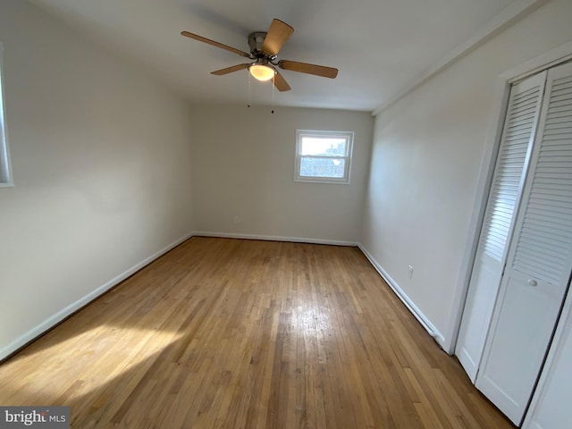 interior space with ceiling fan and light hardwood / wood-style flooring