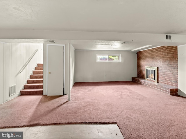 7107 Dower House Rd, Upper Marlboro, MD 20772 - below grade area featuring a fireplace, carpet flooring, and stairway