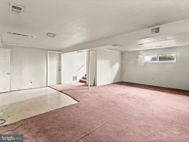 7107 Dower House Rd, Upper Marlboro, MD 20772 - below grade area featuring carpet floors, stairway, and wooden walls