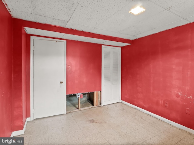 7107 Dower House Rd, Upper Marlboro, MD 20772 - unfurnished room featuring tile patterned floors and a drop ceiling