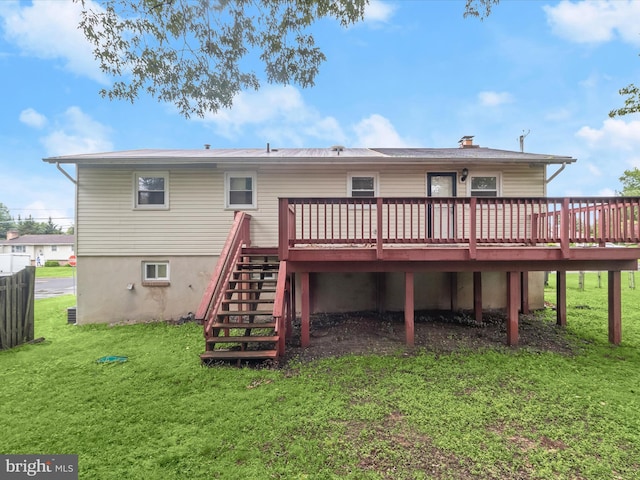 7107 Dower House Rd, Upper Marlboro, MD 20772 - back of property with a deck, a lawn, stairs, and a chimney