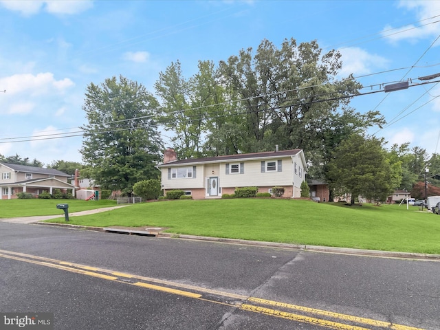 7107 Dower House Rd, Upper Marlboro, MD 20772 - raised ranch with a chimney and a front lawn