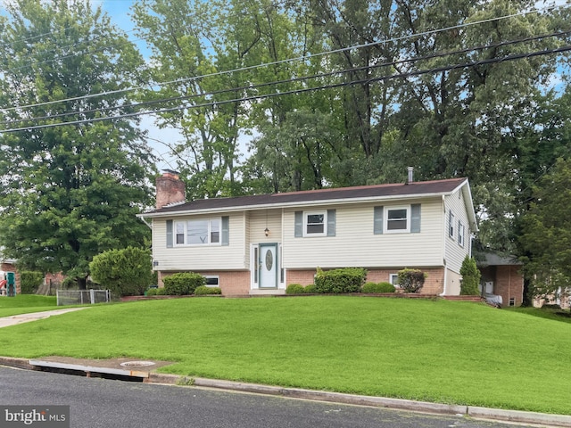 7107 Dower House Rd, Upper Marlboro, MD 20772 - bi-level home featuring a chimney and a front lawn