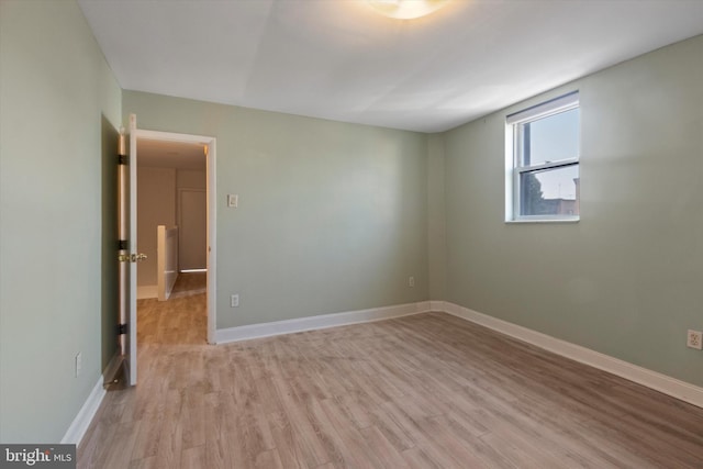 empty room featuring light hardwood / wood-style floors