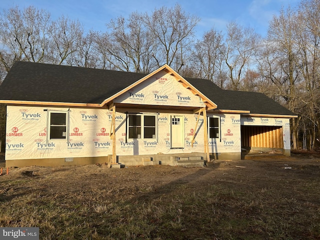 property in mid-construction with crawl space and an attached garage