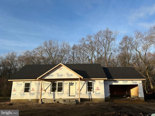 unfinished property featuring a garage and crawl space