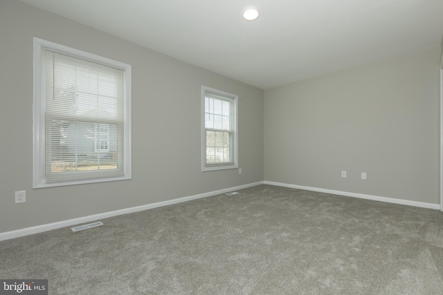 view of carpeted spare room