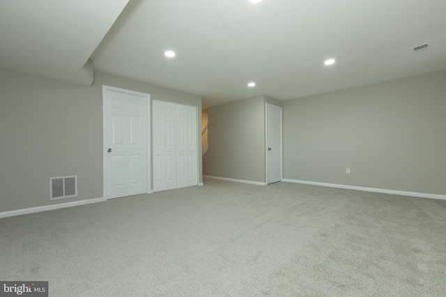 basement with light carpet