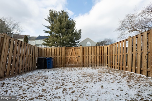 view of yard covered in snow