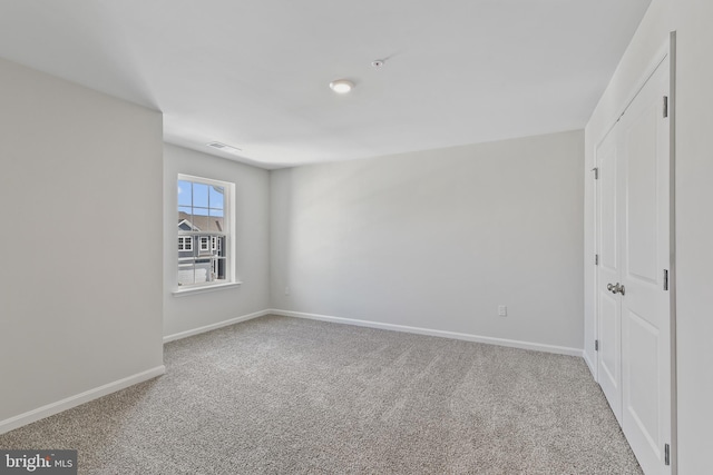 view of carpeted spare room