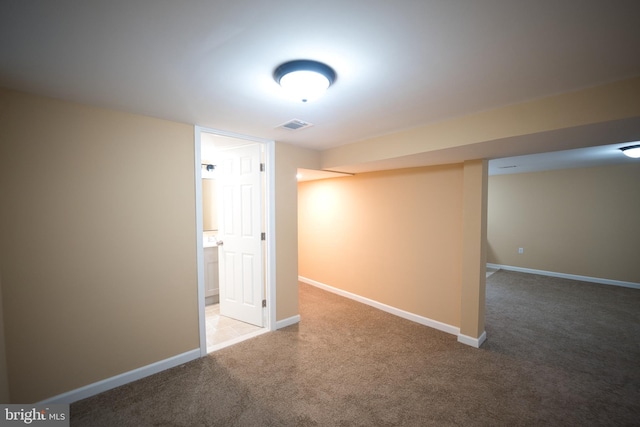 basement featuring carpet flooring