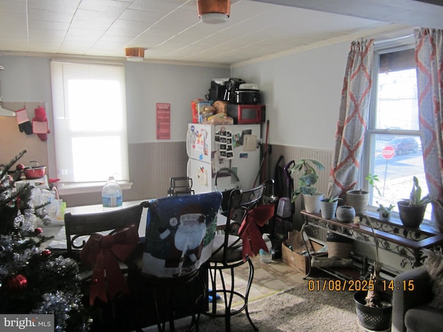 interior space with crown molding