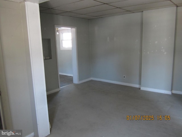 spare room featuring a drop ceiling